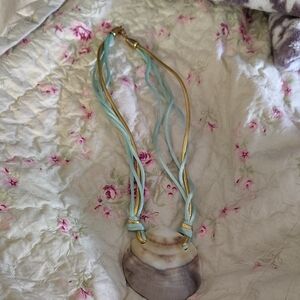 Elegant Blue and Gold Necklace with Layered Strands